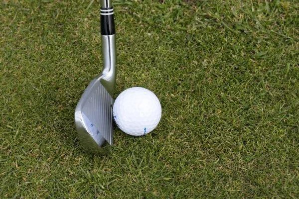 golf iron shot fairway